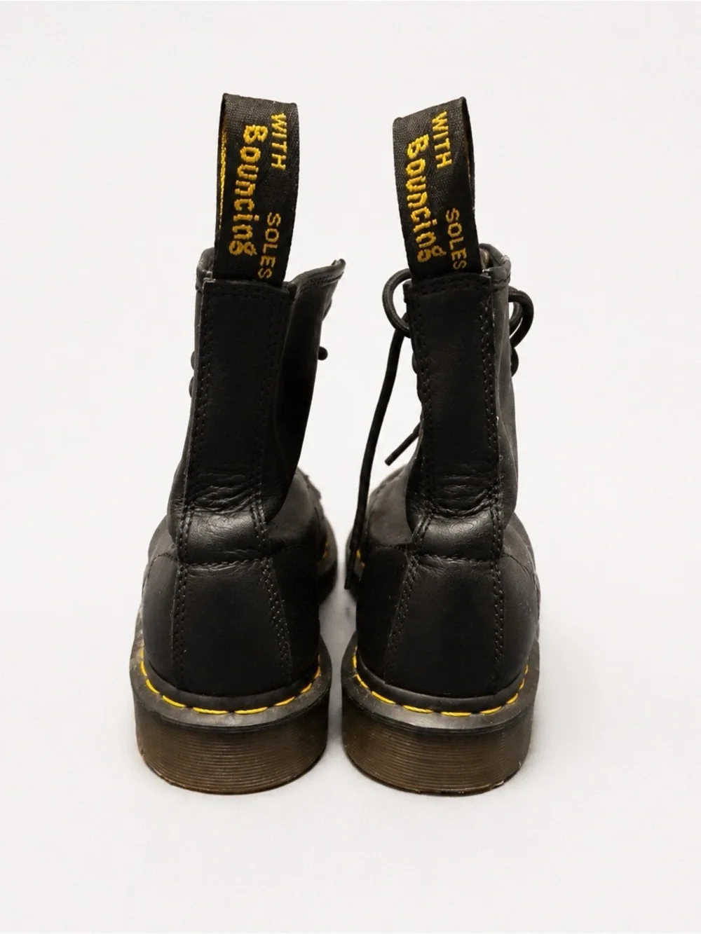 Dr. Martens Black Leather 8-Eye Lace-Up Boots with Yellow Stitching